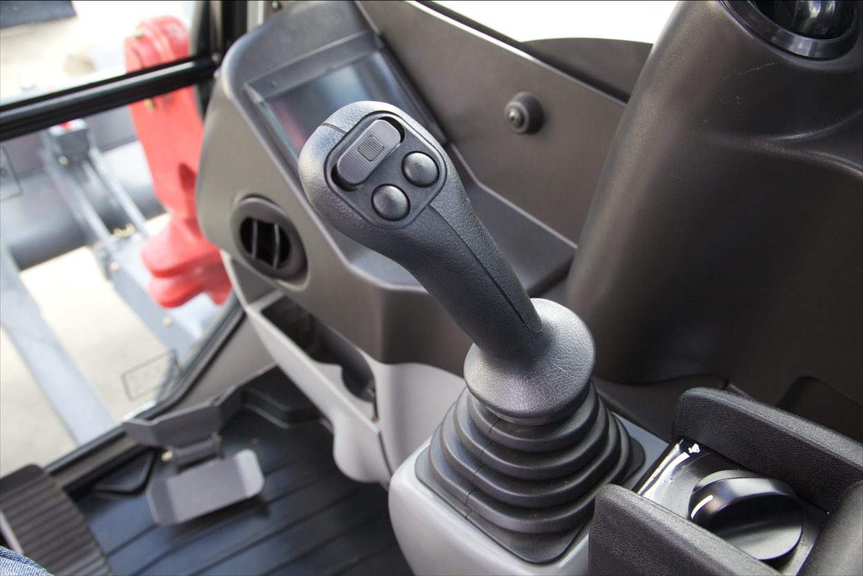 rechter multifunctionele joystick van een Takeuchi TB-290-2 graafmachine