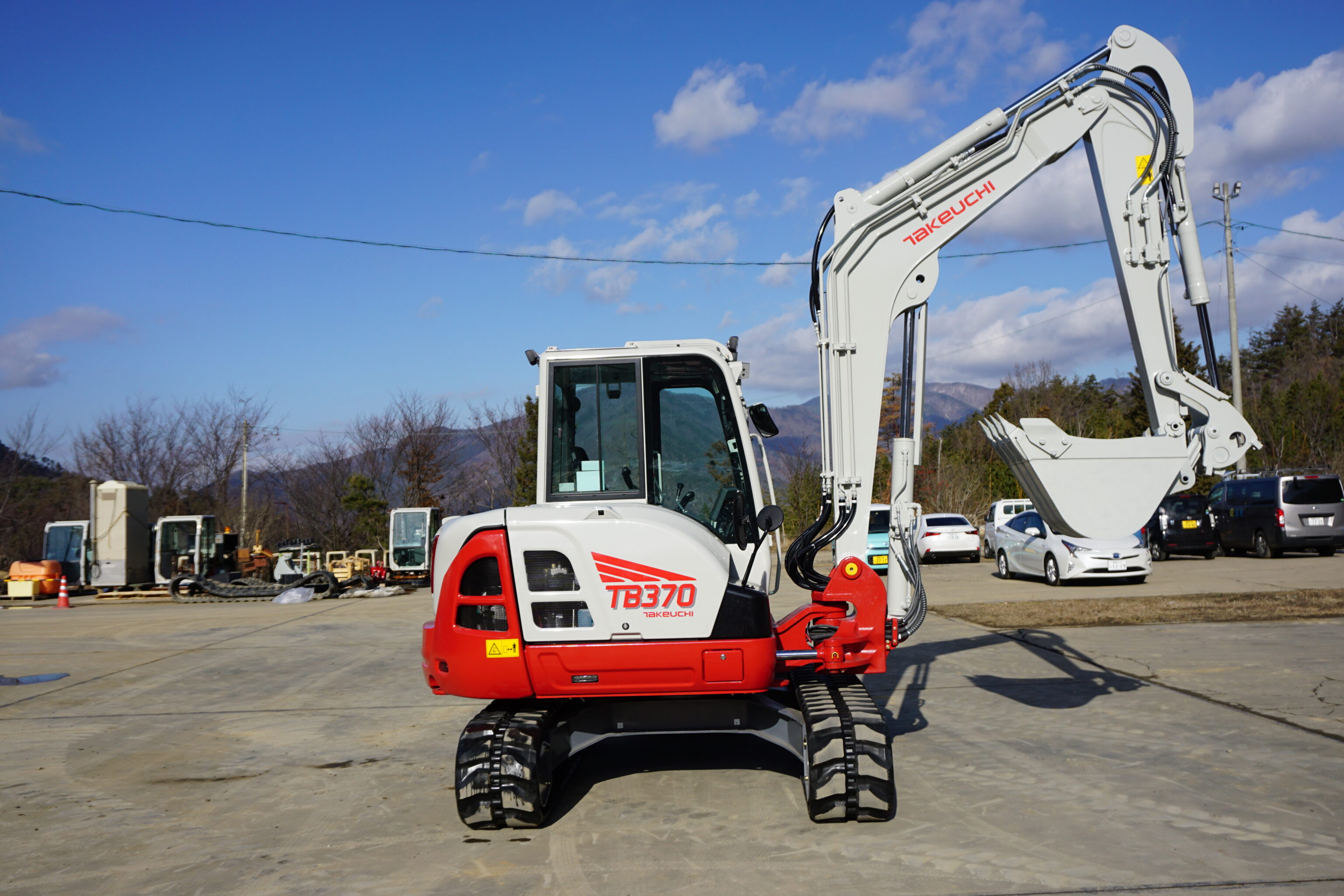 Takeuchi TB370 Monoboom graafmachine met graafbak
