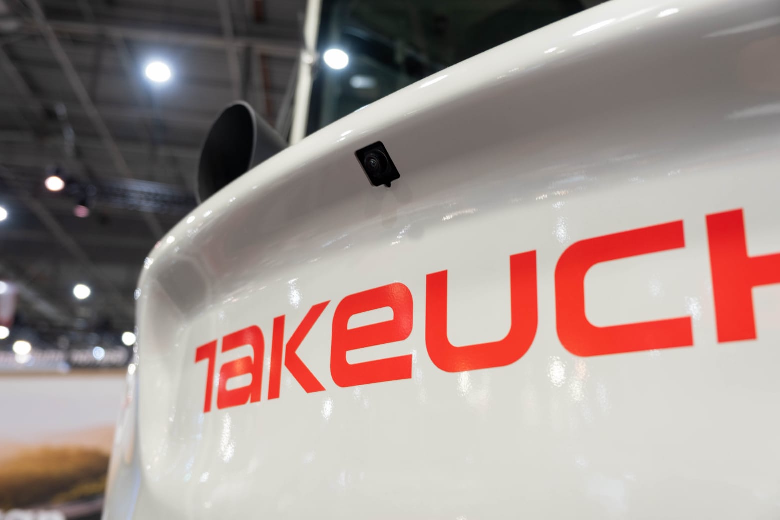 Takeuchi TB370W mobiele kraan naar boven gepositioneerde uitlaat