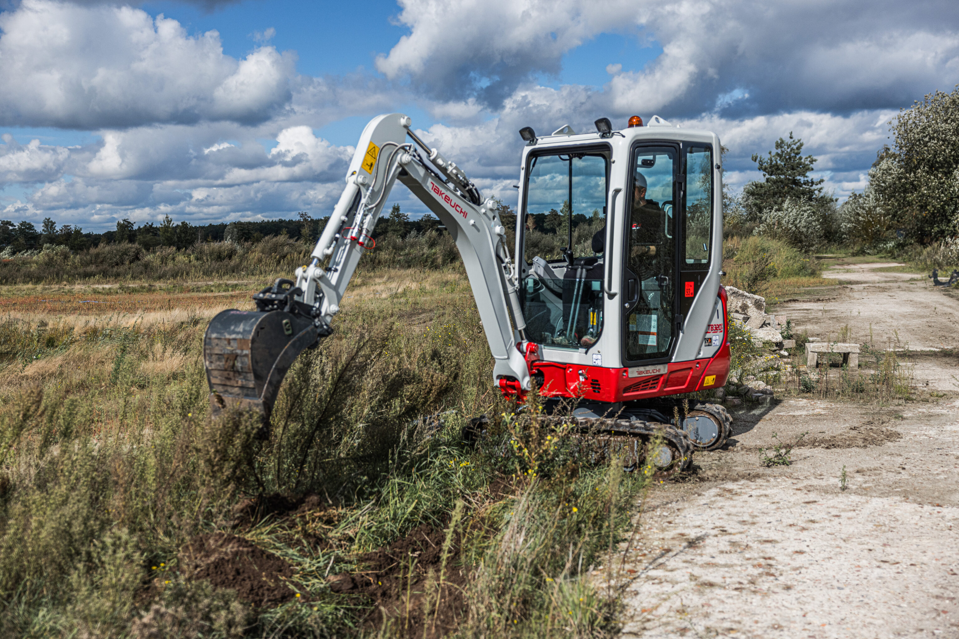 Takeuchi mini graver met een smalle graafbak