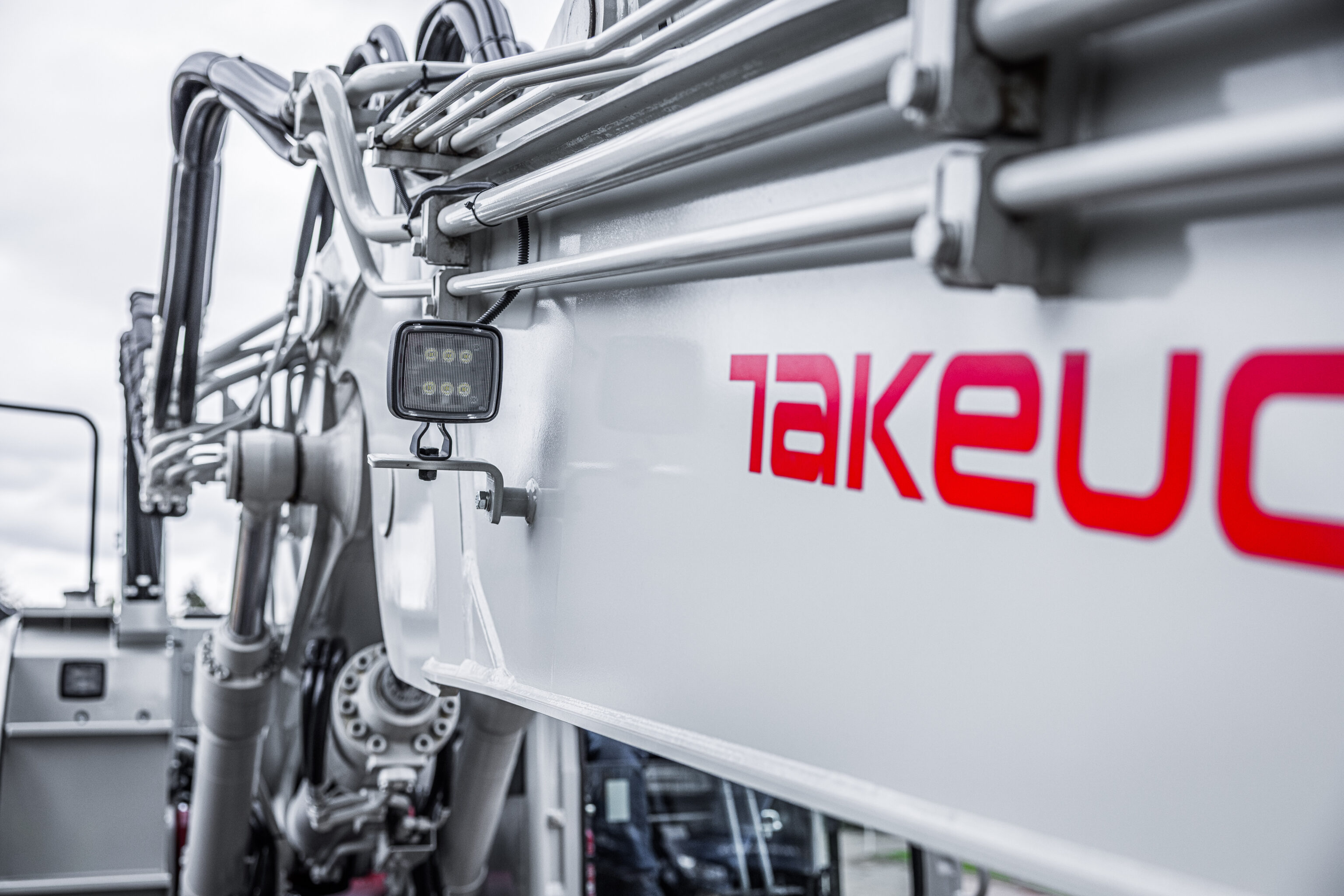 Hydraulische leidingen op een Takeuchi TB3150R