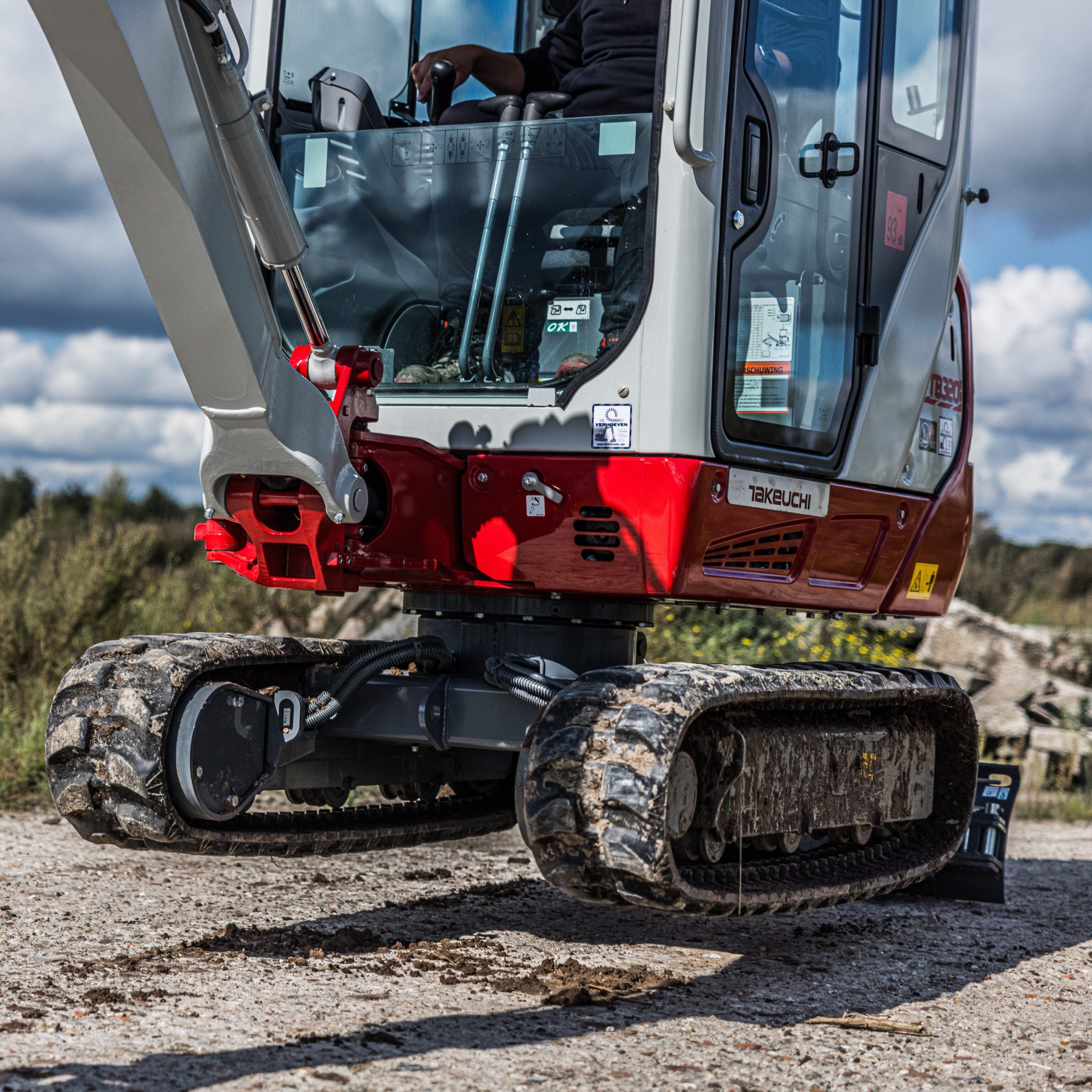 Uitschuifbaar onderstel bij een takeuchi graafmachine